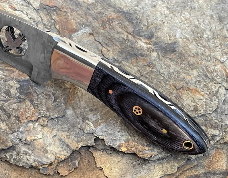 8" Damascus steel fixed blade knife with Black Pakka wood handle.