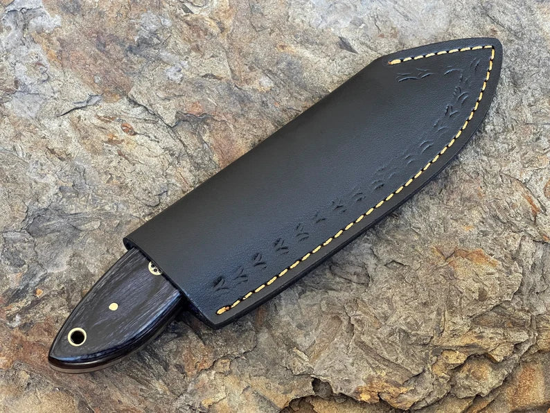 8" Damascus steel fixed blade knife with Black Pakka wood handle.