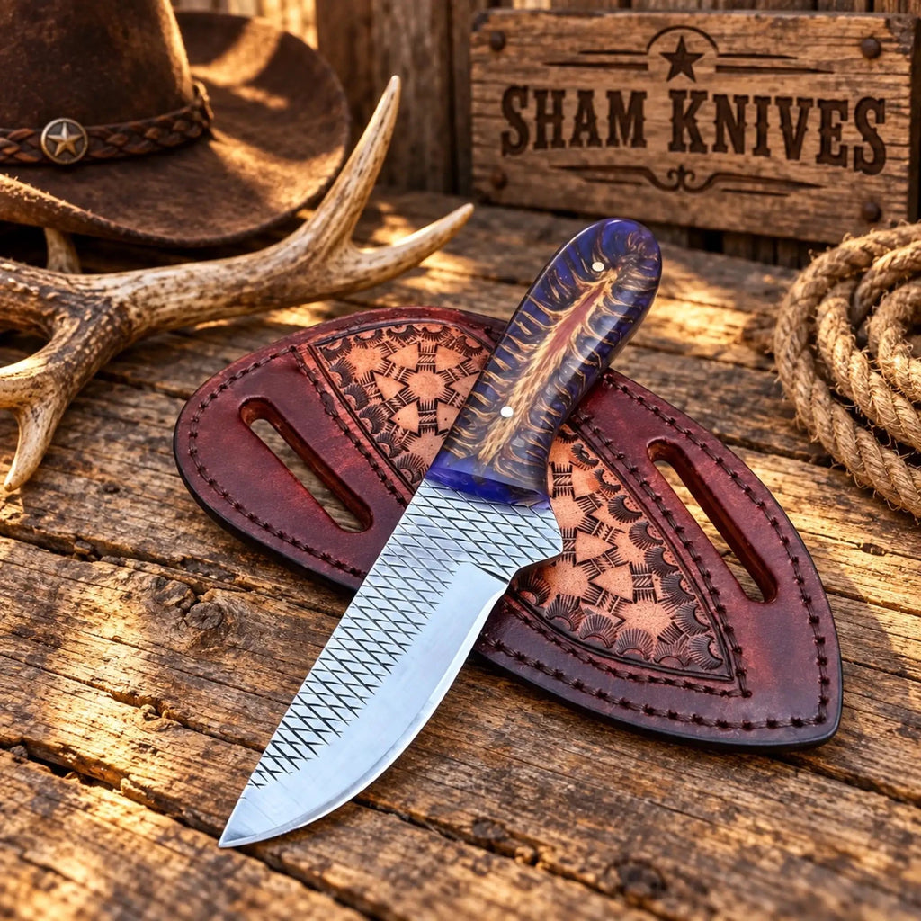 Blue Pine Cone Cowboy Skinning Knife – Rasp Steel & Pancake Sheath - SHAM KNIVESSkinning KnifeSHAM KNIVESCowboy skinning knife displayed with pancake leather belt sheath