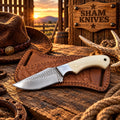 Bone Trail Cowboy Knife with cream bone handle and rasp steel blade

