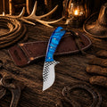 Handmade Country Rasp File hunting knife with blue epoxy resin handle and cross draw leather sheath.