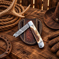 Cowboy Damascus trapper folding knife with natural stag horn handle