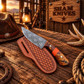 Custom etched Western skinning knife with amber resin handle