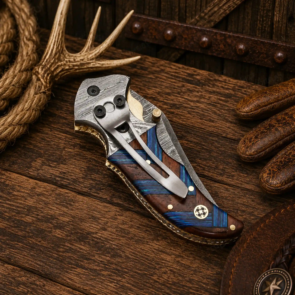 Premium Damascus steel folding pocket knife featuring a razor-sharp 1095 and 15N20 blade, compact wood handle, under lock mechanism, and genuine leather sheath.