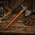 Handmade Damascus steel pipe tomahawk with wooden handle and genuine leather sheath.