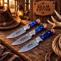 Holy Trinity Damascus steel cowboy skinning knife set with blue epoxy handles
