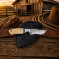 Pancake sheath knife with bone and turquoise handle on leather belt
