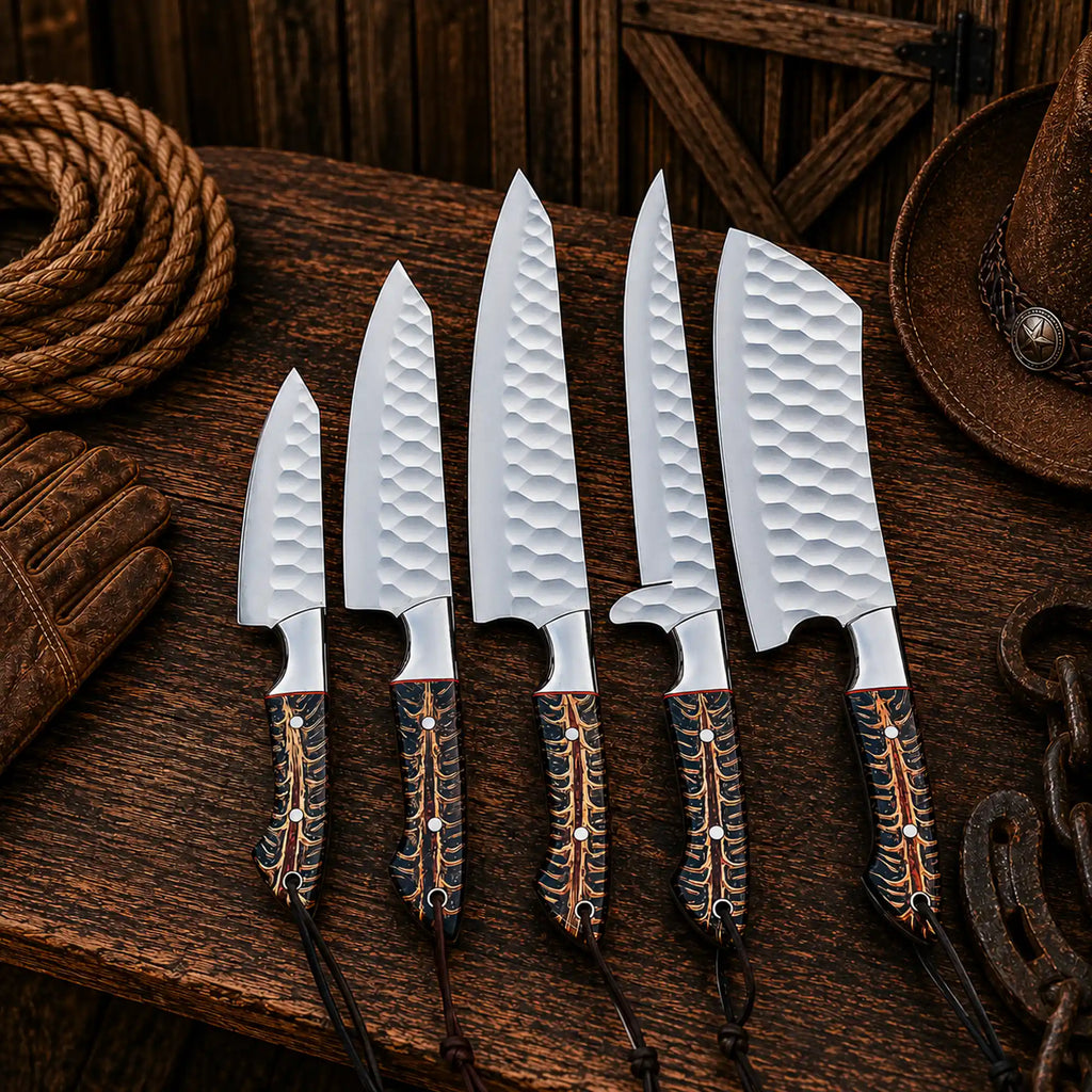 cowboy kitchen knife set with pinecone handles and steel bolsters.