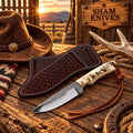 Ram horn cowboy knife with a rasp steel blade, leather lanyard, and brown basketweave sheath
