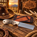 Rasp steel bull cutter knife with a stag antler handle beside a hand-tooled leather sheath
