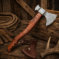 Handmade Damascus steel tomahawk with carved rosewood handle and genuine leather sheath.