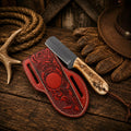 Cowboy belt knife with handcrafted leather sheath and ram horn handle