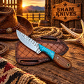 Trail Rancher Western skinning knife with turquoise and wood handle

