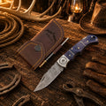 Western Cowboy Damascus folding knife with purple Pakka wood handle with leather sheath