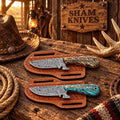 Western pair of Damascus skinning knives with leather sheaths
